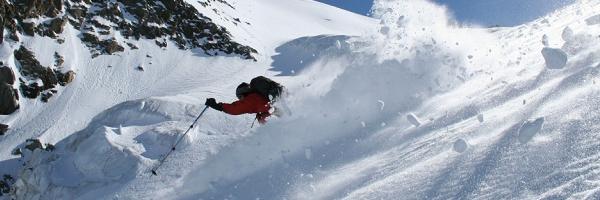 Starting the great ski down from the Domes du Miages in fantastic powder