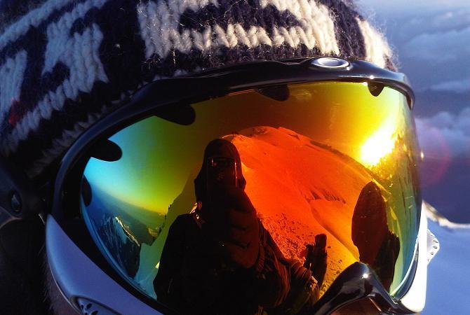 Reflections of Mont Blanc summit in ski goggles