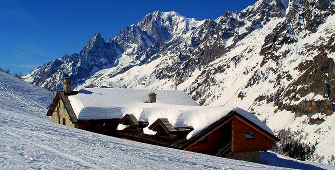 The amazing location of the luxury Bonatti Hut in the Val Ferret with Mont Blanc behind
