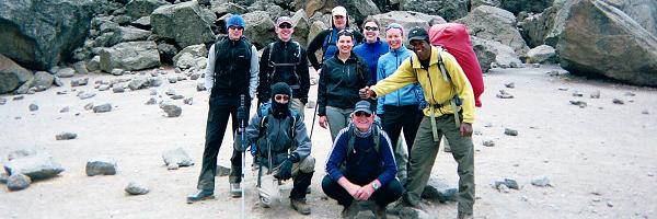 Group photo at the Lava Tower (4600m), with the head local guide Evans on the right