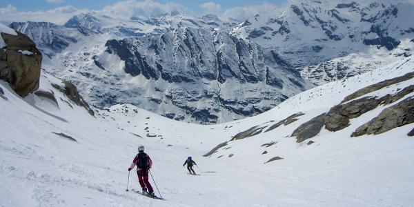 Skiing down from the summit of Gran Paradiso towards Valsavaranches