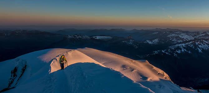 Sunrise on the Bosses Arete of the Gouter route on Mont Blanc