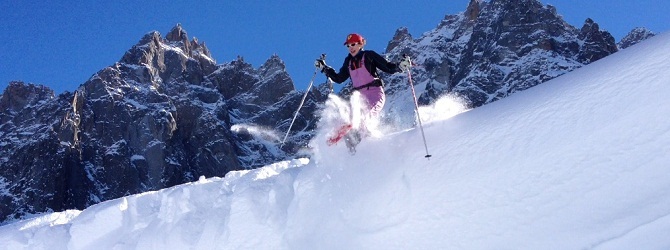 Jumping off a cornice for some air-time on snowshoes!